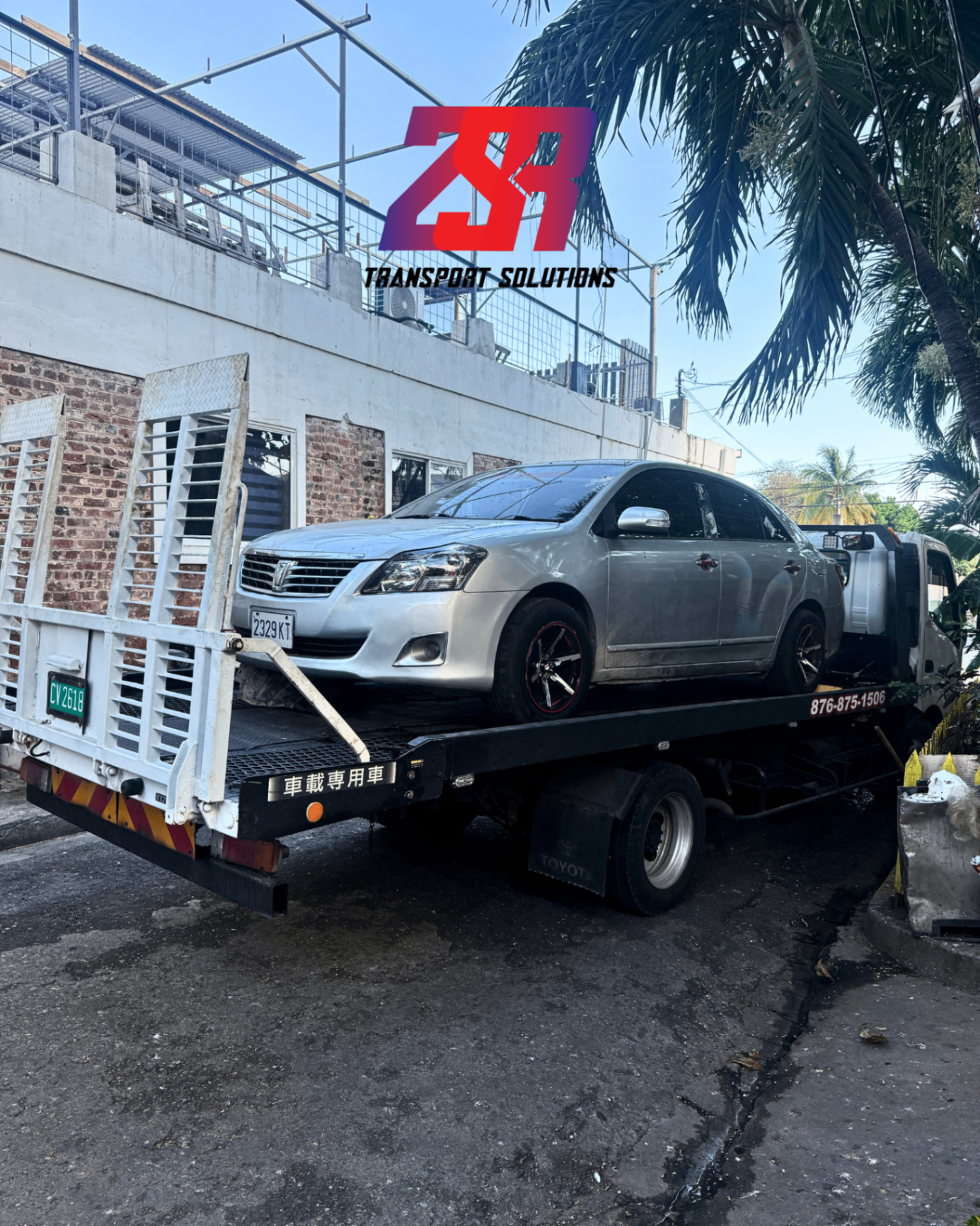 ZSR wrecker towing a vehicle in Jamaica 2