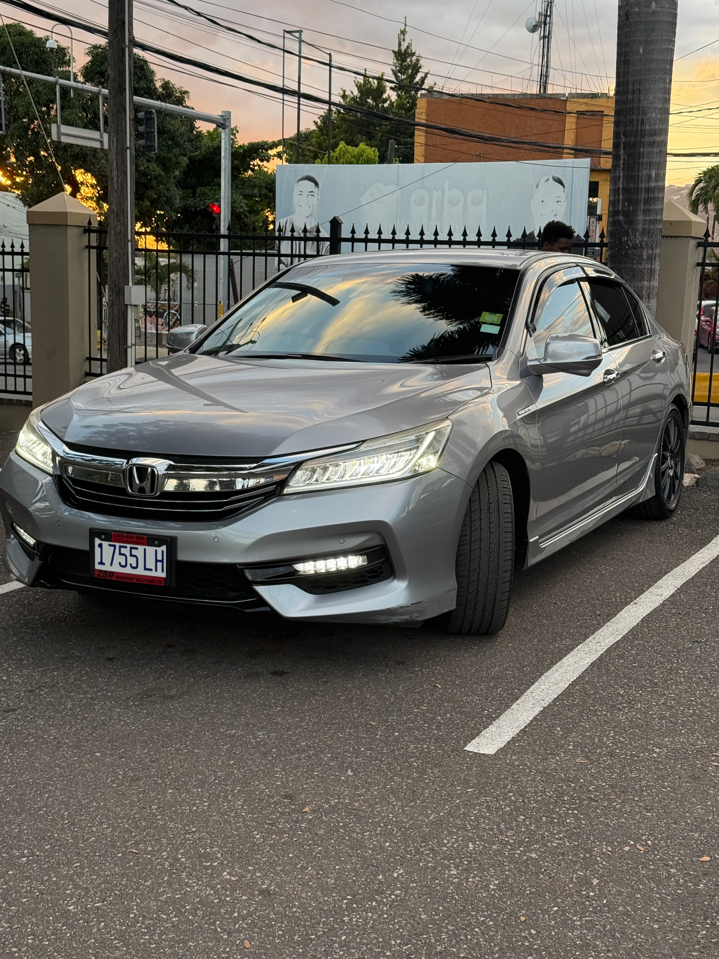 Silver Honda Accord rental — front view